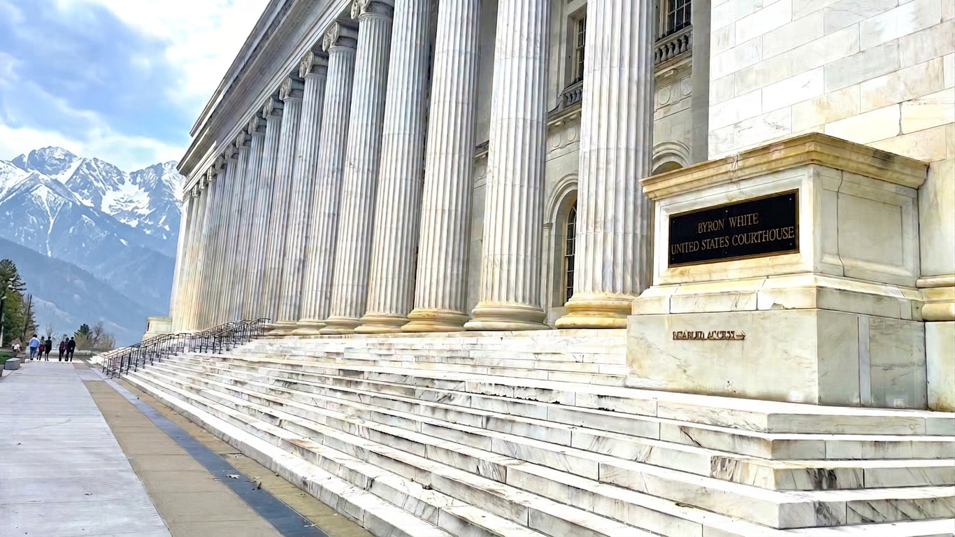 Byron White courthouse with the Rocky Mountains in the background.